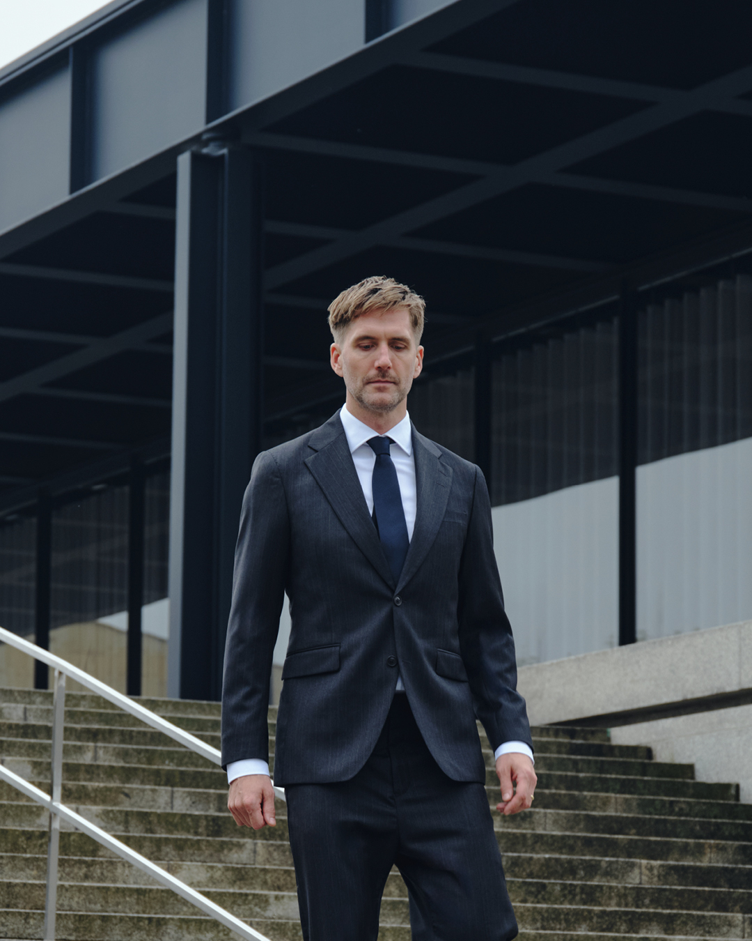 Sigurd in navy suit